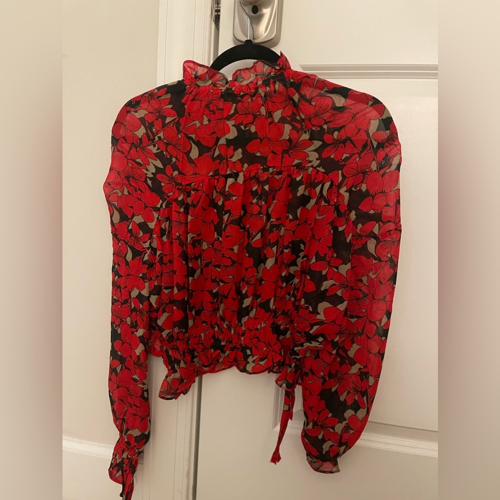 Red and black floral blouse